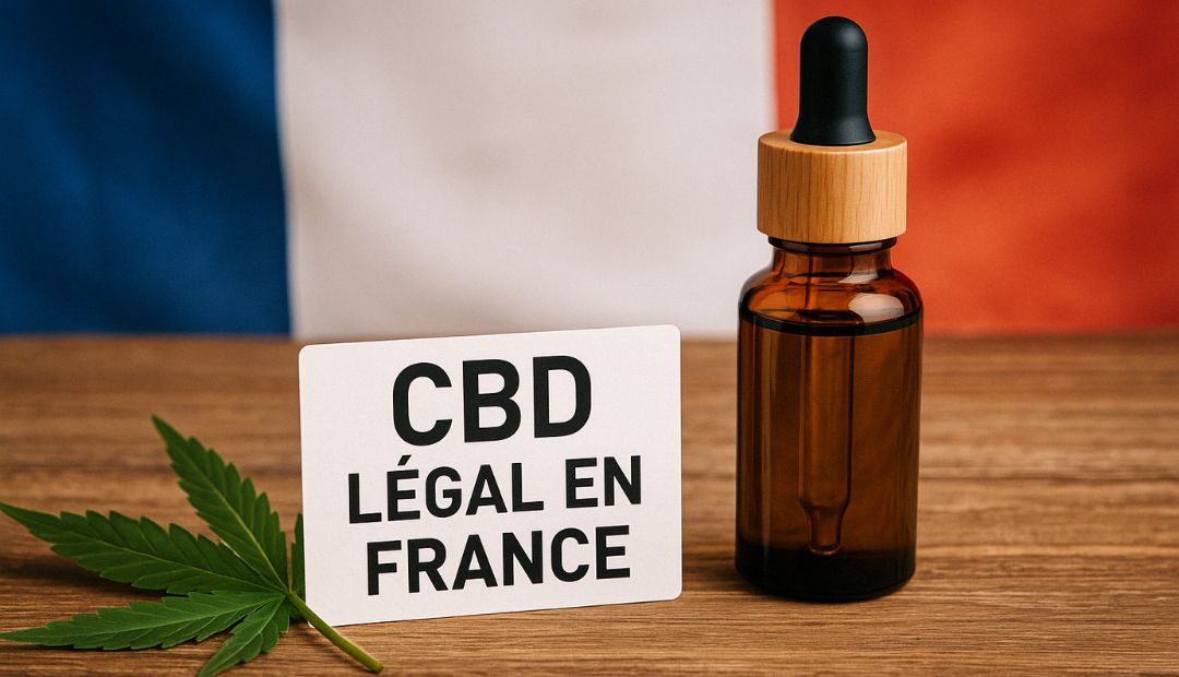 Flacon d’huile de CBD sur fond de drapeau français avec feuille de chanvre, illustrant la légalité du CBD en France